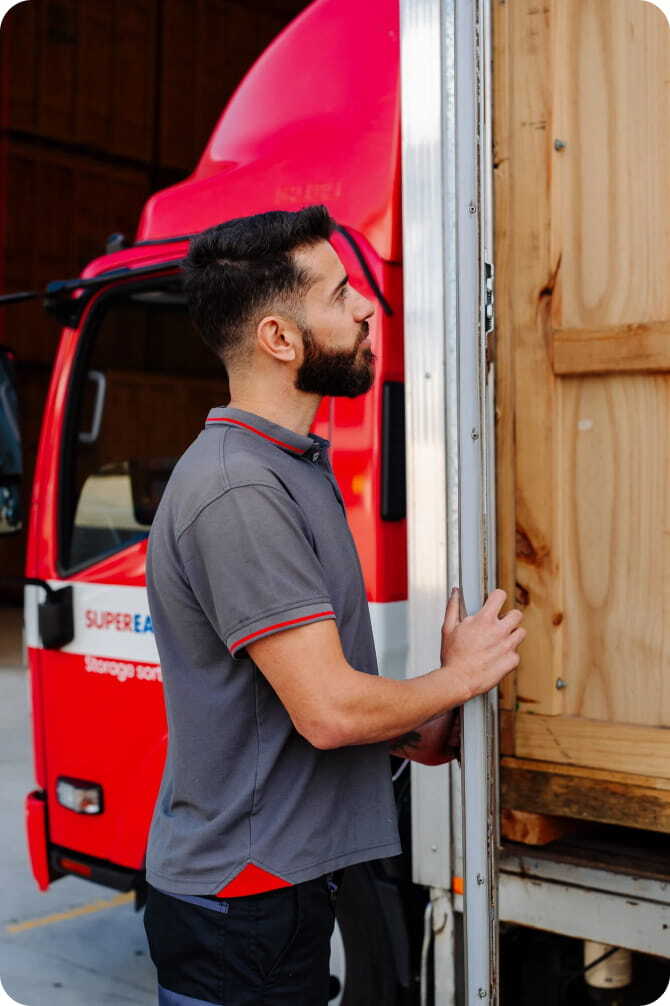 Super Easy Storage team member loading a storage module